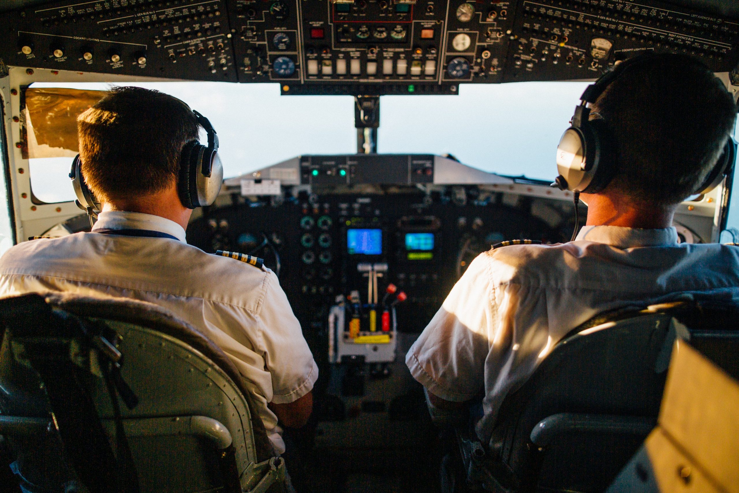 rear view of pilots inside cockpit